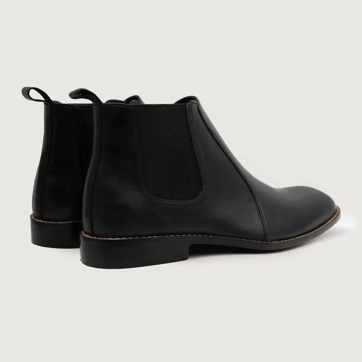 High-Traction Rubber Outsole & Lug Tread Pattern on Clarkson Chelsea Black Leather Boots For Men