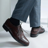 Styled On-Foot Perspective Demonstrating Ankle Fit & Silhouette on Model