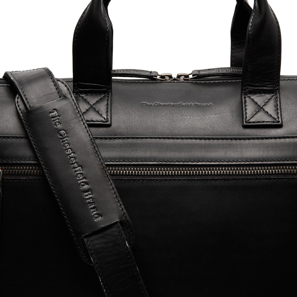 
Solid Antique Brass Hardware & Heavy-Duty Dual Zipper Detail on Levanto Кожаная сумка для ноутбука