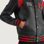 
Крупный план деталей of Varsity & Snap Button Hardware on Liberte USA Black Leather Varsity Jacket