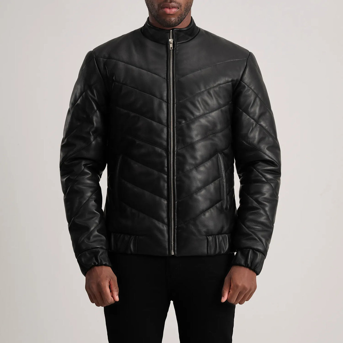 Close-Up Detail of Classic Collar &amp; Zipper Hardware on Travis Black Leather Puffer Jacket